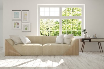 Fototapeta premium White stylish minimalist room with sofa and smmer landscape in window. Scandinavian interior design. 3D illustration
