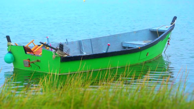 Rowboat moored in a foggy little cove on Cape Cod