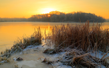 Frosty. winter sunrise on the river.