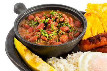 Traditional Colombian dish called Banda paisa: a plate typical of Medellin that includes meat, beans, egg and plantain