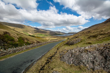 Fototapeta na wymiar Irish countryside with road and lake 