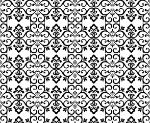 Wallpaper in the style of Baroque. Seamless vector background. White and black floral ornament. Graphic pattern for fabric, wallpaper, packaging. Ornate Damask flower ornament