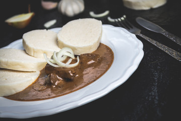 Beef goulash with dumplings