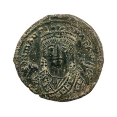 Ancient copper or bronze byzantine coin isolated on white