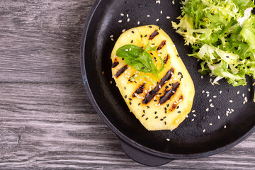 Vegetarian salad with grilled mango, fresh frisee and sesame