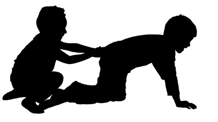 Silhouette of two boys playing
