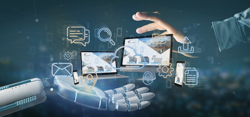 Cyborg hand holding a Devices connected to a cloud multimedia network 3d rendering