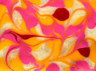 Fototapeta na wymiar Vibrant red and yellow marbling texture. Abstract colorful background. Liquid marble paint.