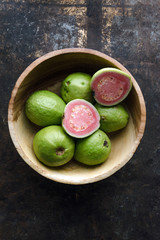 Fresh ripe guava on rustic background