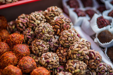 healthy handmade sweets made from fruit juice, nuts and seeds close-up. healthy snack for children and adults. concept of proper nutrition