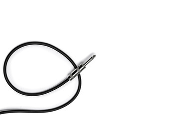 Guitar audio jack with black cable isolated on white background