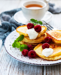 Delicious pancakes with raspberries