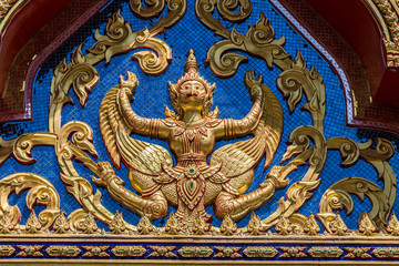 Fototapeta na wymiar Buddhist temple Wat Kaew Manee Si Mahathat at sunny day in Phang Nga, Thailand
