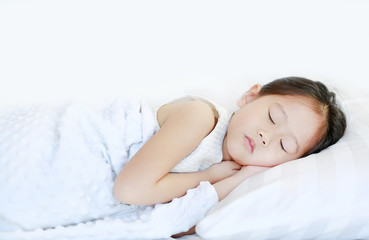 Obraz na płótnie Canvas Sleeping beautiful Asian child girl lying on bed.