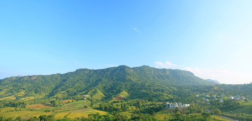Landscape view of blue sky mountain and village in Thailand.