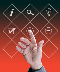 Hand vor Display - Symbolfoto für Business und Entscheidungen