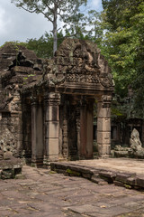 Fototapeta na wymiar Stone portico of entrance to Banteay Kdei