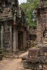 Stone portico opposite another building in temple