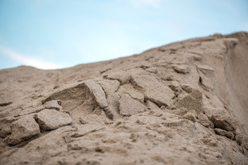 Large piles of construction sand and gravel used for asphalt production and building. Limestone...