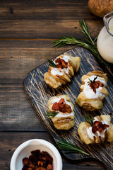 Baked potato with bacon and fresh yogurt