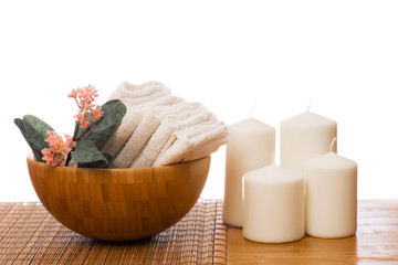 Spa still life with aromatic candles, flower and towel. - Imag