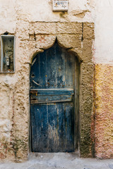 Old arabic door in Morocco (Marrakesh). Traditional oriental style and design in Muslim countries