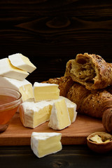 slices of cheese brie or camembert with croissants