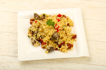 Bulgur with chicken hearts