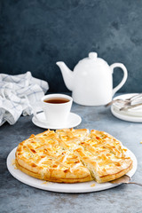 Pie with salted soft cheese and greens