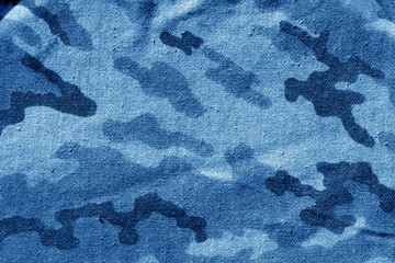 Dirty camouflage cloth in navy blue tone.