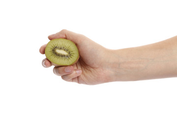 piece of ripe kiwi in hand on a white background. In isolation.