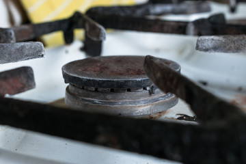 Old dirty gas stove. Vintage gas burner