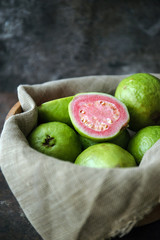 Fresh ripe guava on rustic background