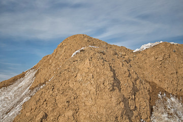 Clay earth and sky. Clay background. Red earth. 
