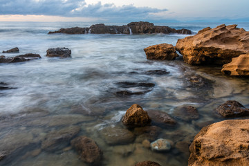 Long Exposure of the Mediterranean Sea along the Southern Italian Mediterranean Coast at Sunset