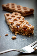 Linzer Torte is traditional Austrian cake with a lattice design on top of the pastry. Filled with jam.