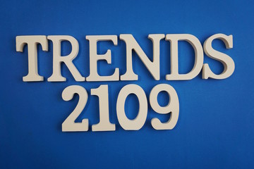 Trends 2019 word alphabet letters on blue background