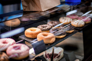 Fototapeta na wymiar doughnuts on display. Donuts of different tastes