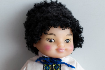 Face of boy doll in the Ukrainian national clothes