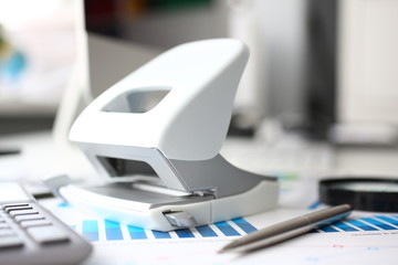 Silver calculator and financial statistics on clipboard