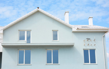 Obraz premium Unfinished house construction with incomplete balcony installation