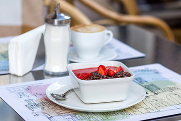 Granola with chocolate and strawberry.