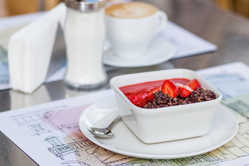 Granola with chocolate and strawberry.