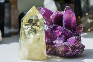 Citrine stone and amethyst. Yellow, clear crystal with dark, smokey color, smoky quartz with...