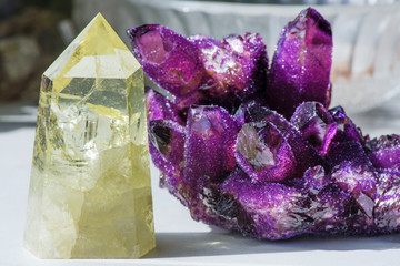 Citrine stone and amethyst. Yellow, clear crystal with dark, smokey color, smoky quartz with...