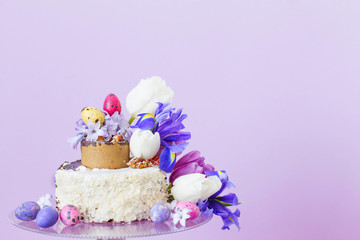 Obraz na płótnie Canvas cake with Easter eggs and flowers