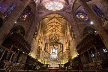 Fototapeta na wymiar PALMA DE MALLORCA, SPAIN - SEP 30, 2018: Gothic style of interior in Cathedral of Santa Maria of Palma (La Seu) in Palma de Mallorca, Spain
