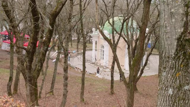 Rotonda in park with people walking here and there. Meniral water buvette in Pyatigorsk