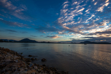 The background of the blue sky, natural wallpaper, the lake, has the atmosphere of the wind and the beautiful morning sun, seen during travel