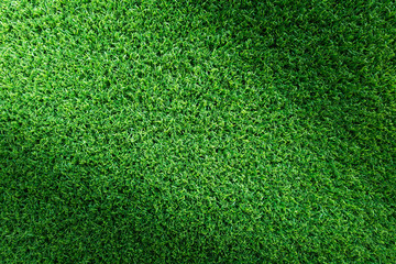 Obraz premium Grass texture background for golf course, soccer field or sports concept design. Artificial green grass.